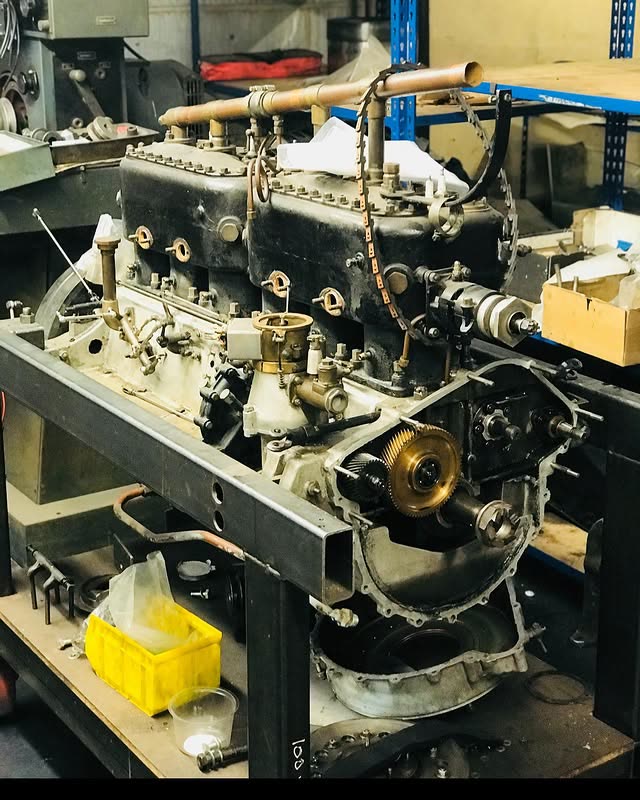 A classic engine stripped down on the bench mid-rebuild